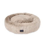 Round dog bed with raised walls and faux fur calming material in latte colour